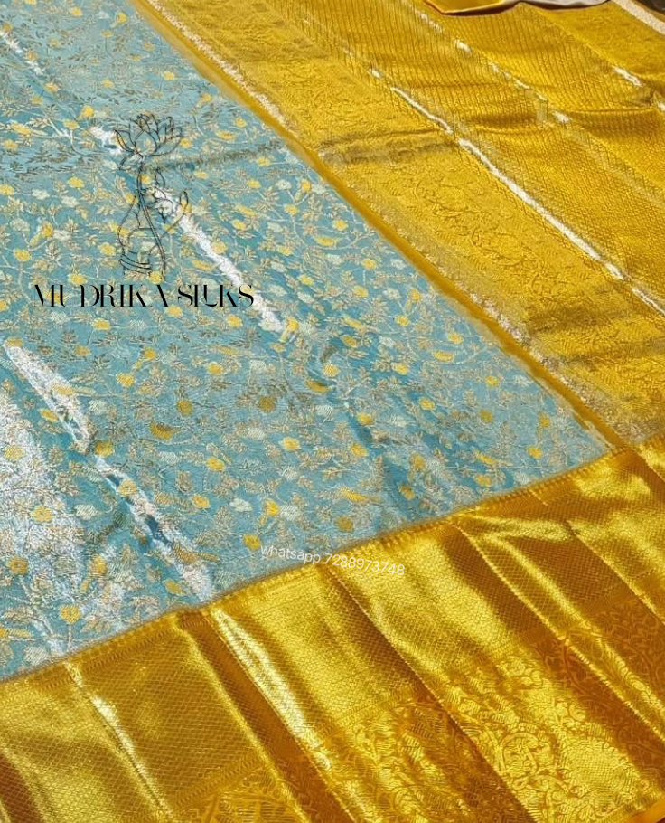 Kanchipattu tissue silk saree with yellow border