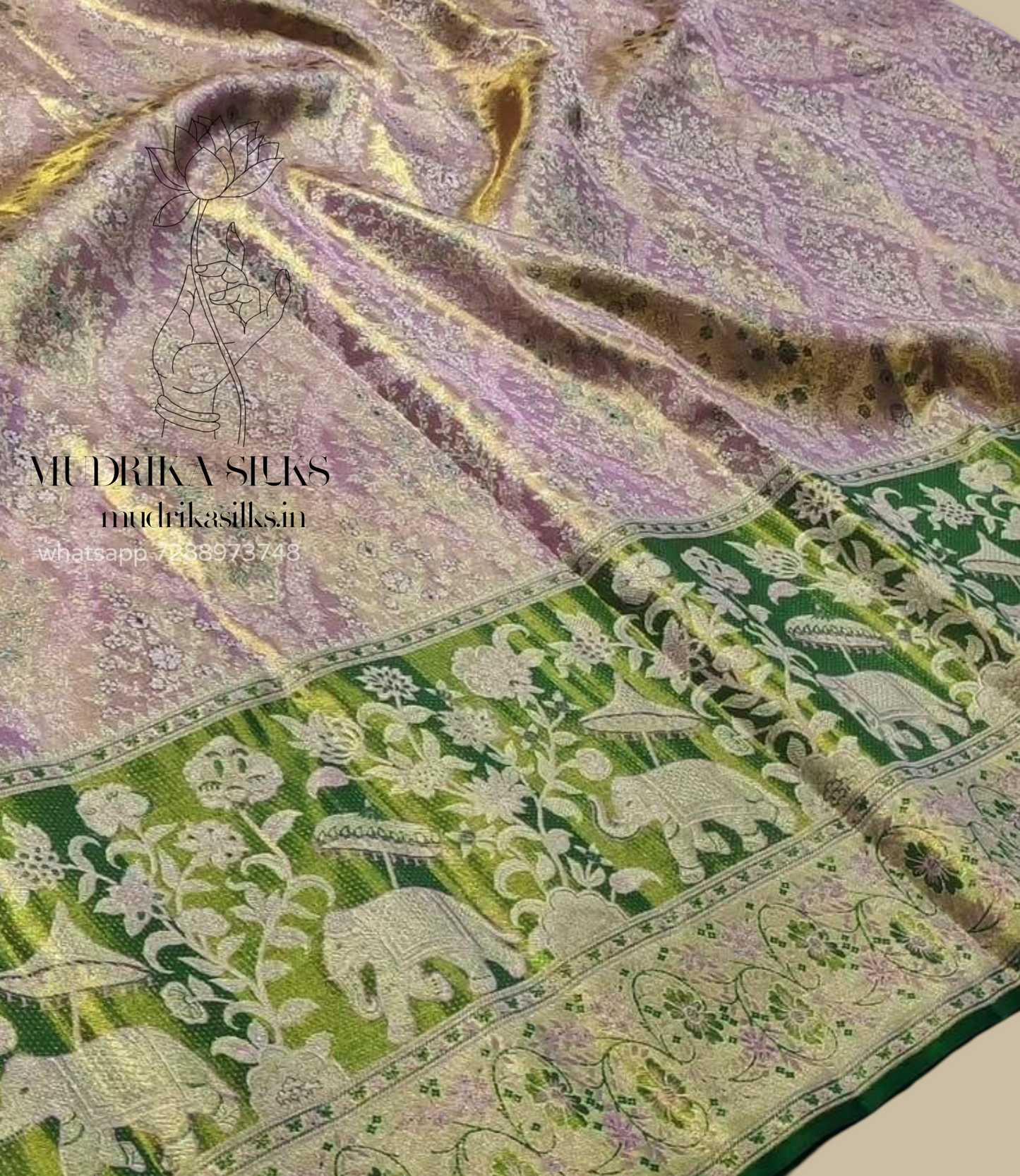 Bridal kanchipuram silk saree with allover floral design and green border