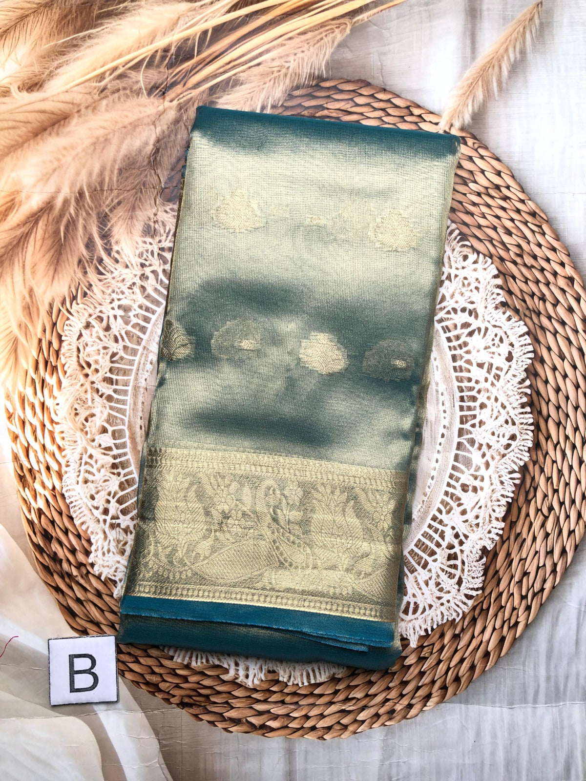 Tissue Saree with zari Buttas and border