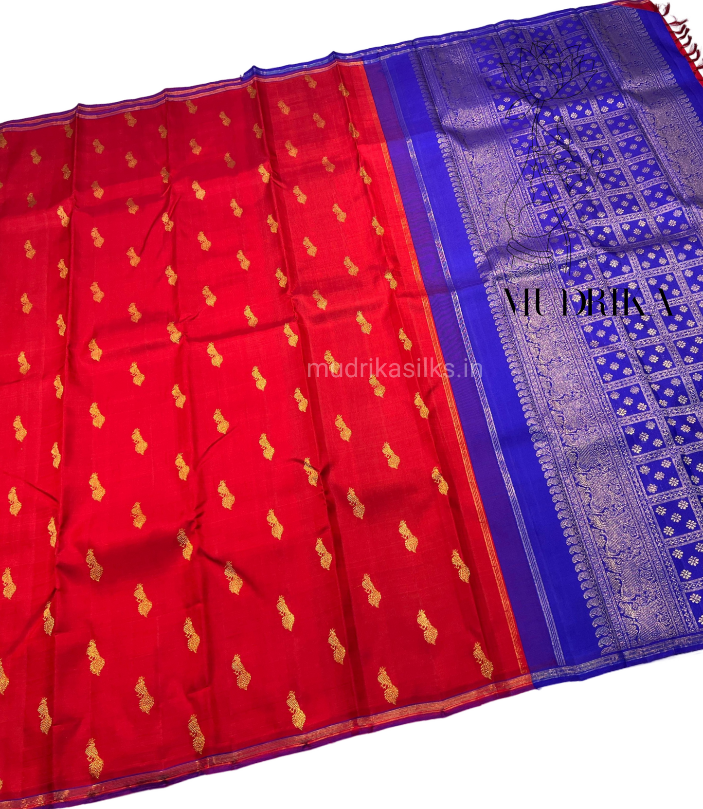 Red pure Kanchipattu saree with peacock motifs