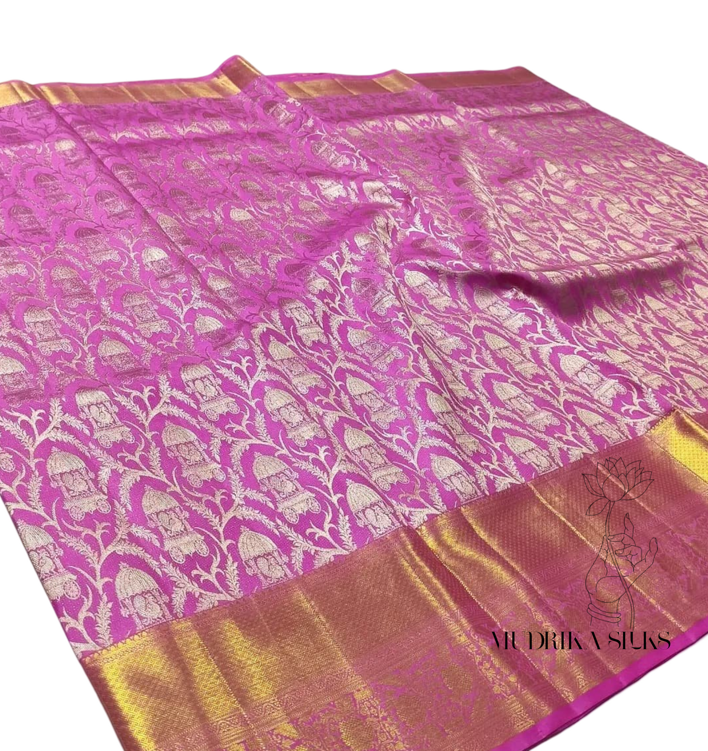 Pink Kanchipattu saree with allover zari weaved design