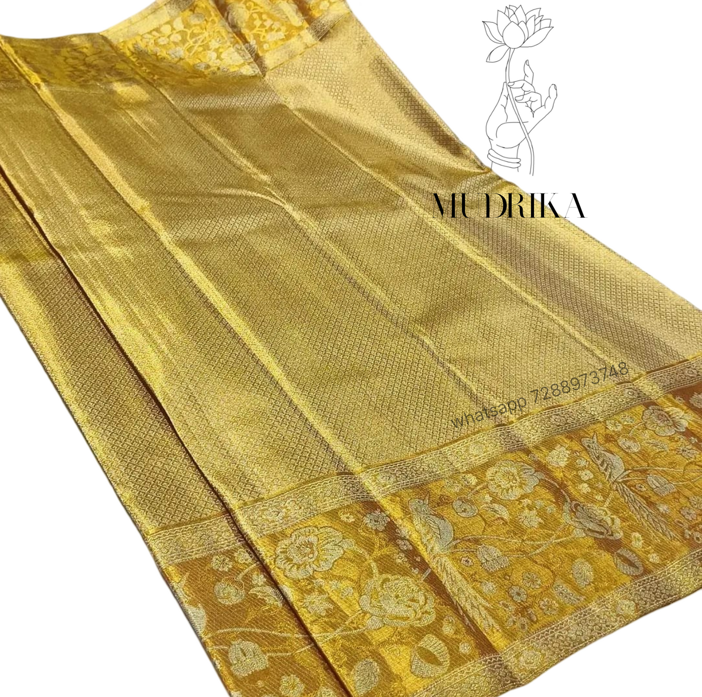 Tissue golden saree with zari floral design
