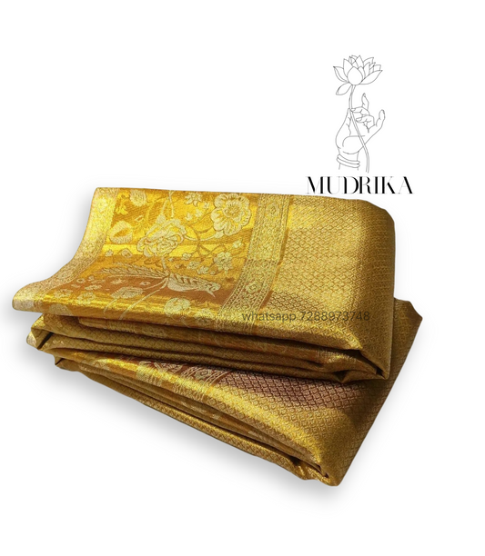 Tissue golden saree with zari floral design