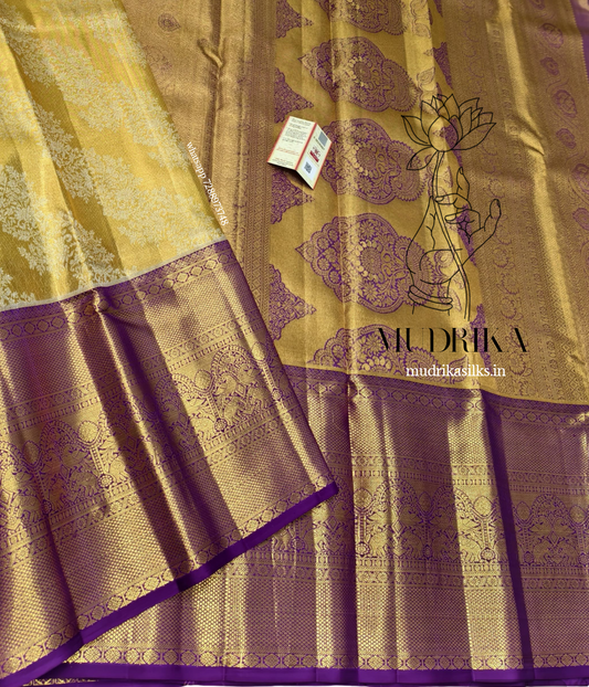 Yellow Kanchipattu Tissue Silk Saree with purple border