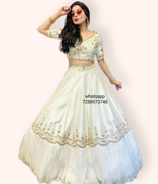 Half white Rawsilk lehenga with handwork