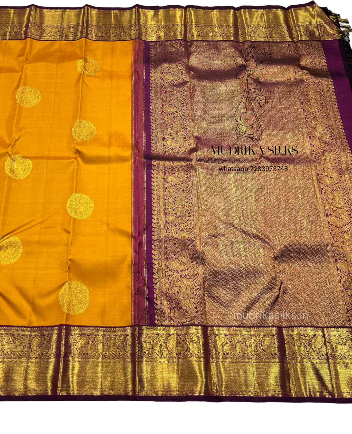 Mustard yellow Kanjivaram pattu sarees with jamun pink border