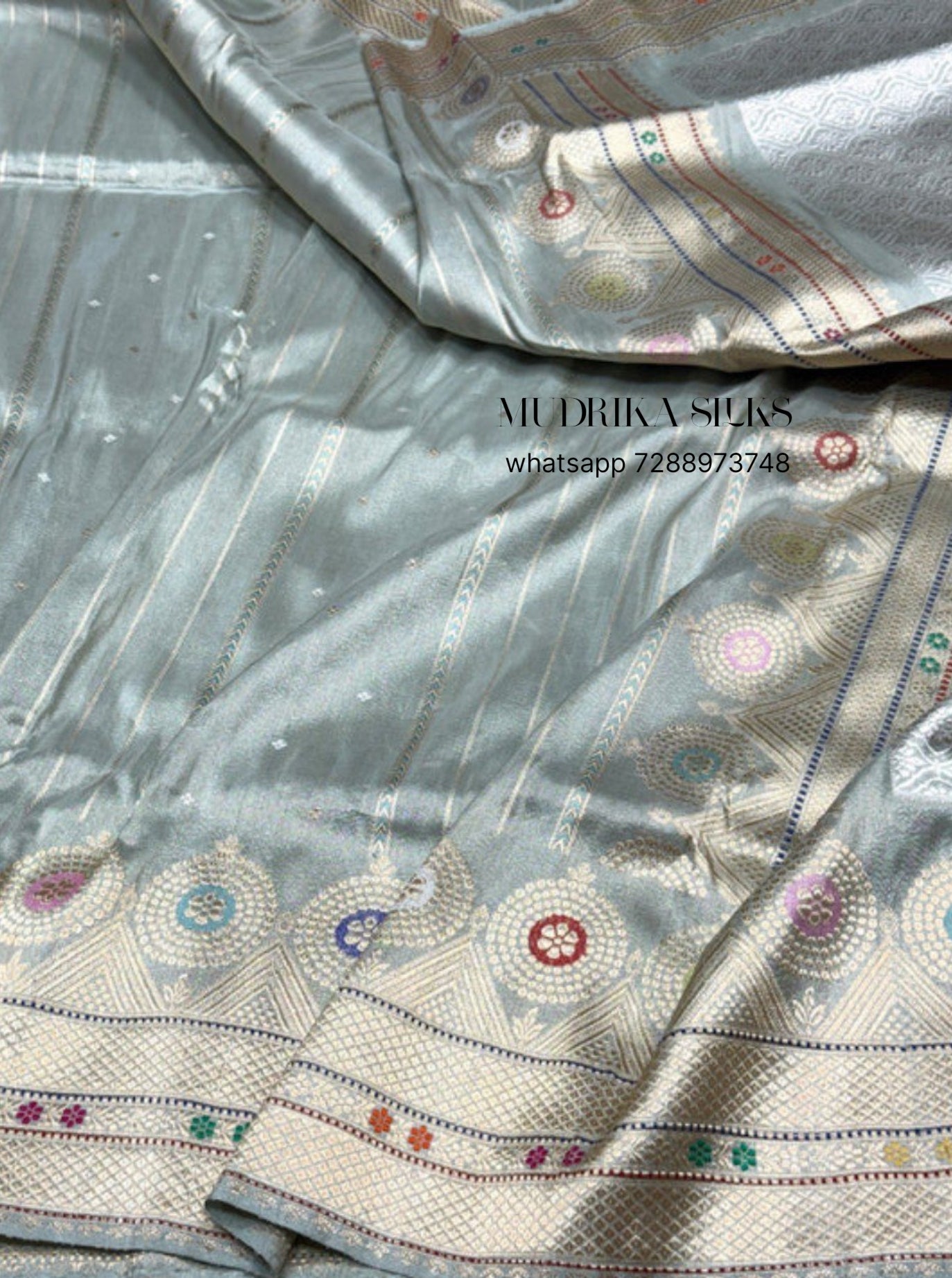 Grey benaras pure silk saree with silver zari strips